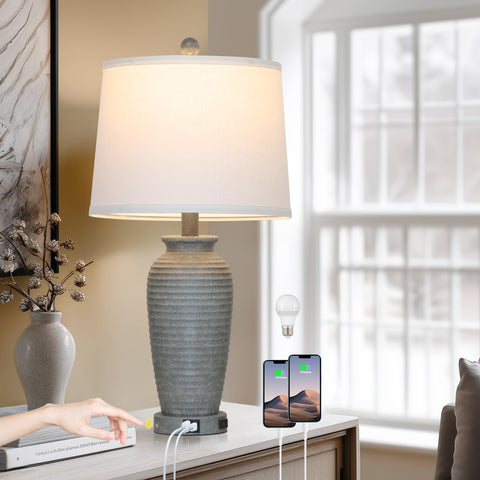 CINSARY 25-inch gray farmhouse jar lamp base adds rustic charm to a living room.