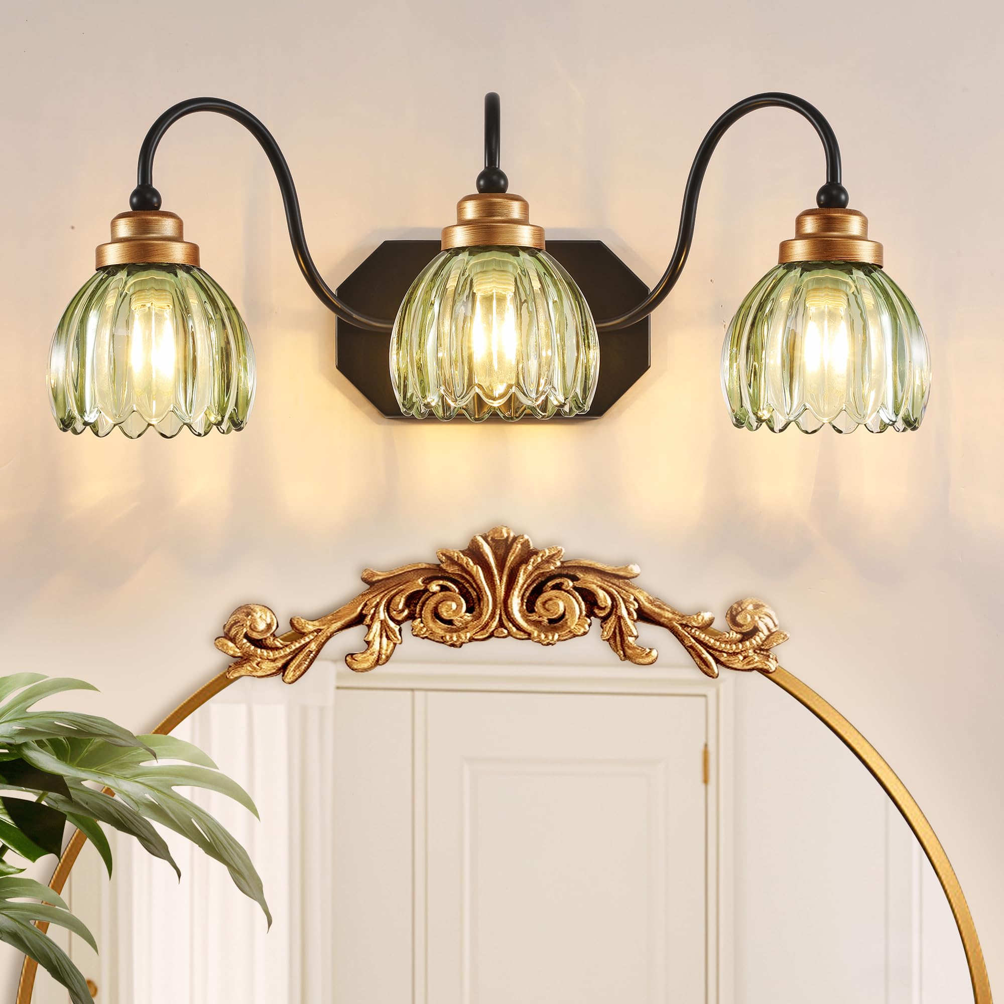 CmnVmn vintage vanity light with green shades provides soft ambient bathroom illumination.