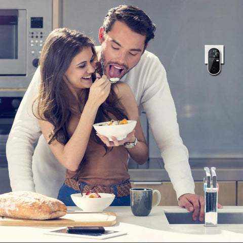 Wall-mounted 3-in-1 CO detector showing LCD readings in real time