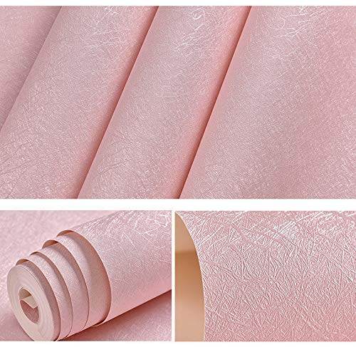 Bedroom ambiance enhanced by soft pink wallpaper with durable vinyl