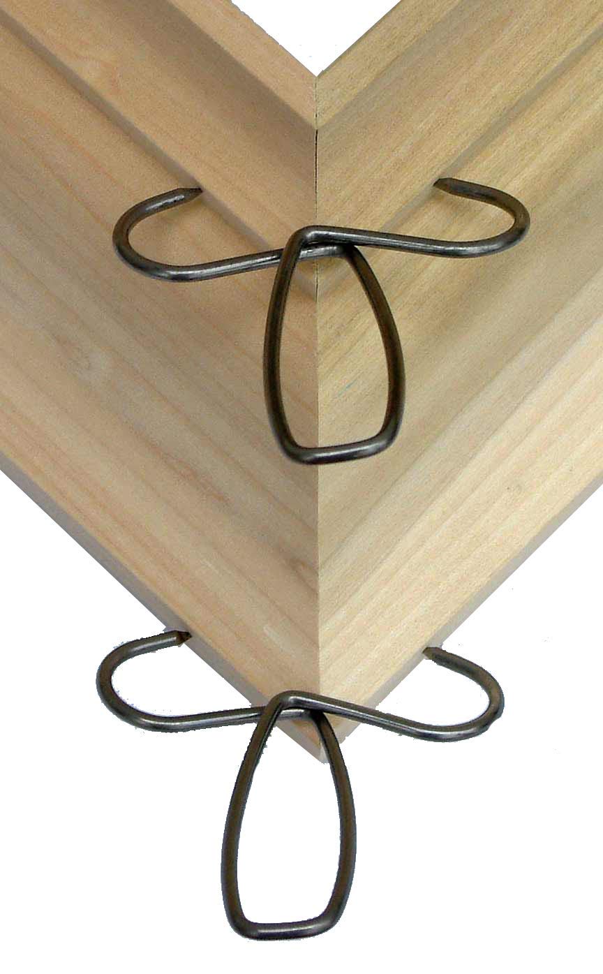 Collins Tool setup showing glue drying with secured corners.