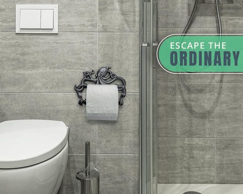 Nautical bathroom accent featuring octopus hooks complements coastal decor.