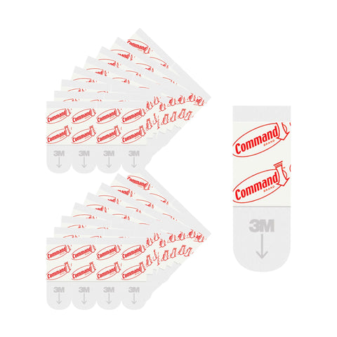 Command damage-free wall adhesive close-up demonstrates clean removal with no wall residue.