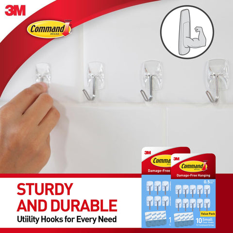 Command hooks on painted walls keep decor secure without holes.
