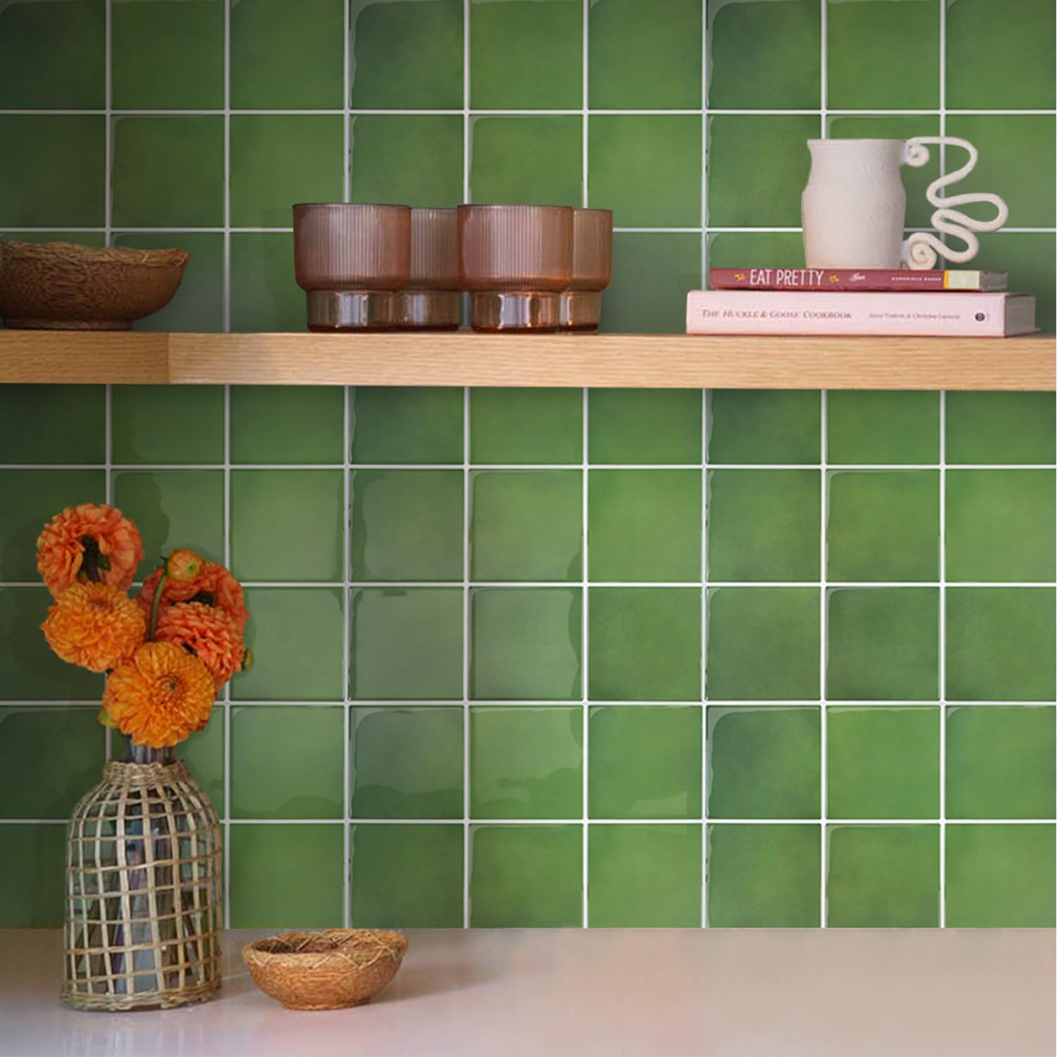 Commomy 12x12 inch peel-stick tiles with a 3D pattern for a striking kitchen backsplash.