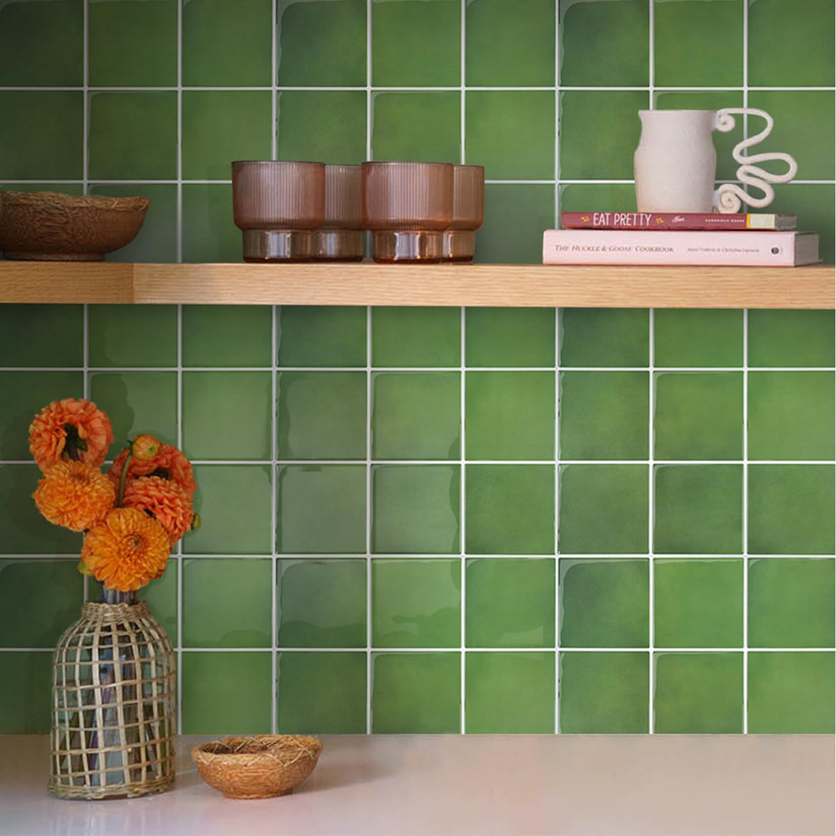 Commomy 12x12 inch peel-stick tiles with a 3D pattern for a striking kitchen backsplash.