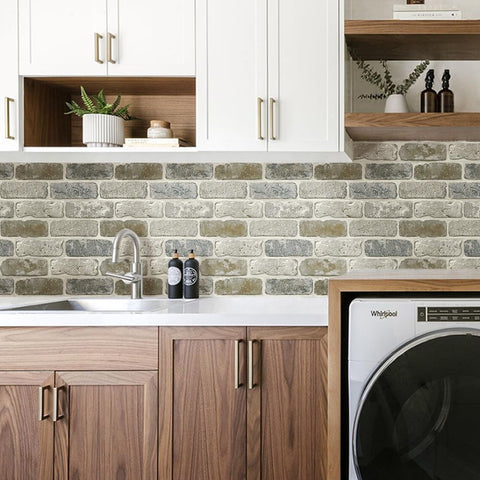 COMSTICKC peel-and-stick brick tiles highlighting quick kitchen backsplash option.