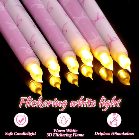 Conelist Coquette pink bow flameless taper candle displaying warm light for cozy dinners.