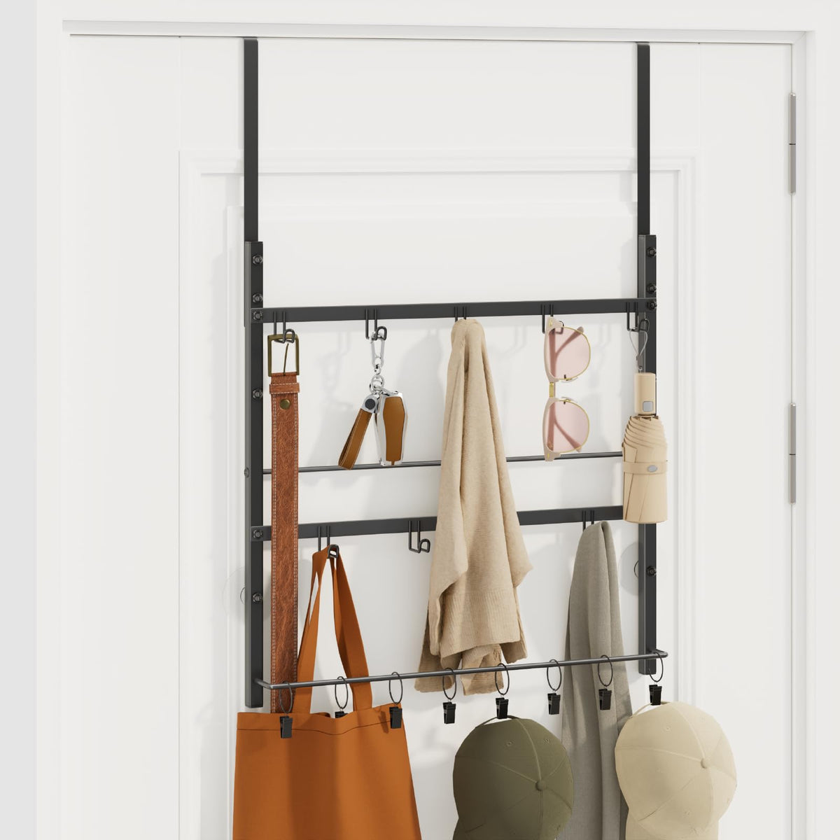 Consumest 3-tier over-the-door organizer storing coats and scarves behind the door.