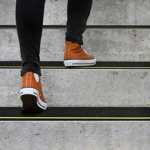 COSIMIXO stair tread on concrete stairs enhances nighttime visibility.