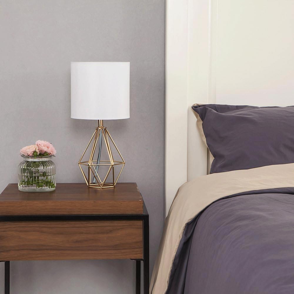 COTULIN gold lamps framing a living room corner for balanced glow