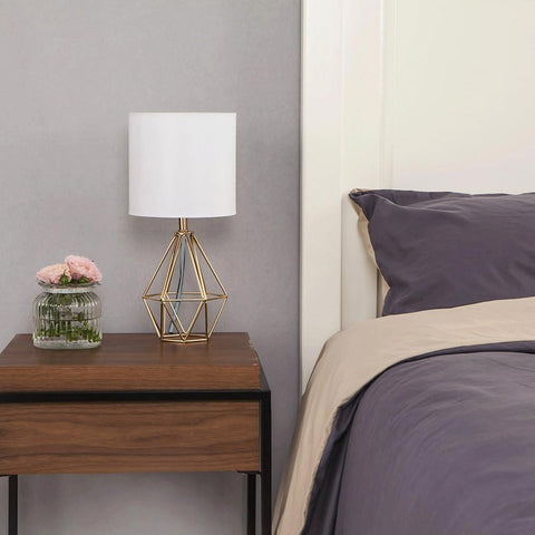 COTULIN gold lamps framing a living room corner for balanced glow
