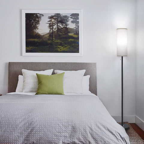 Coucrek floor lamp side view shows slender minimalist design
