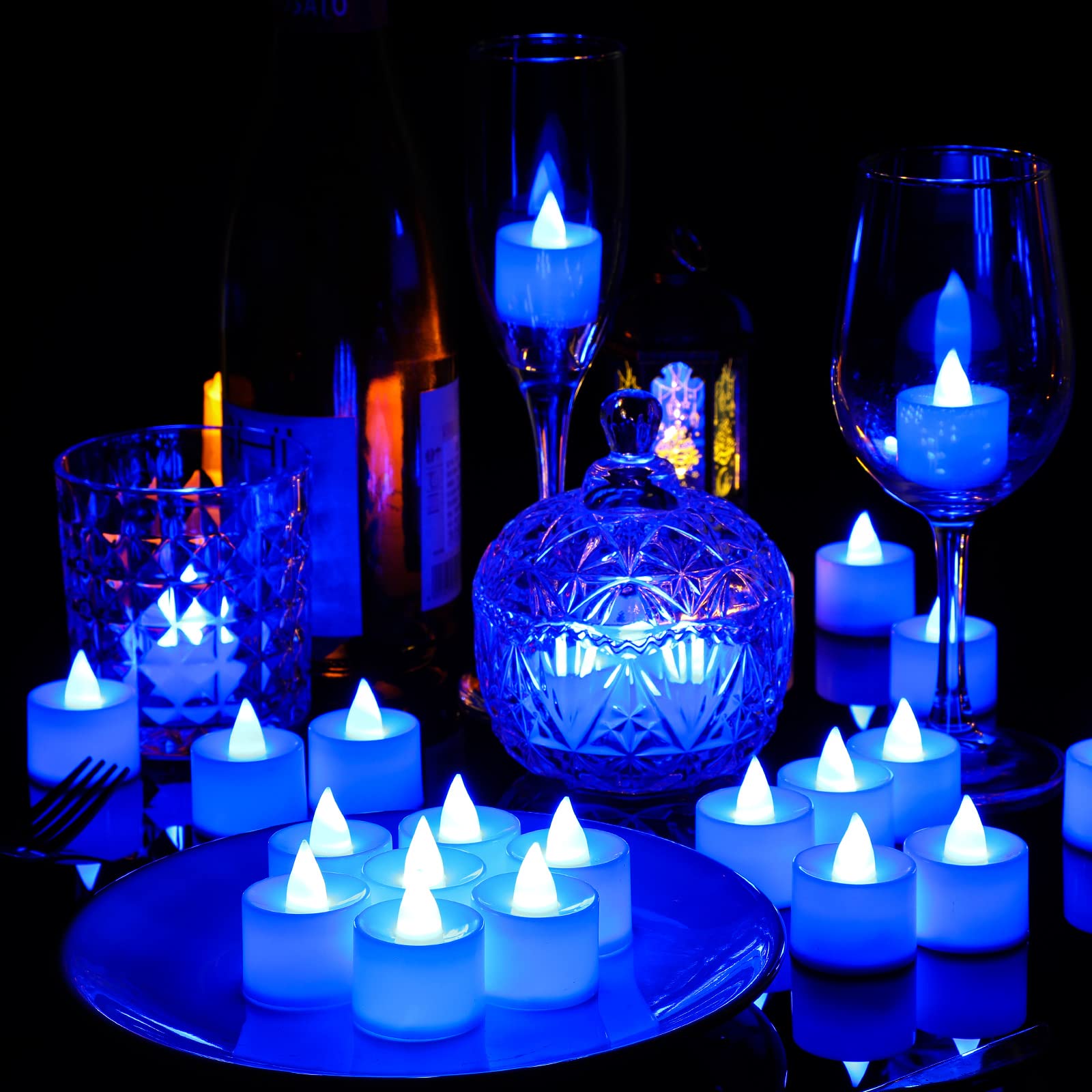 Coume blue flameless tealight ideal for cozy dinners and celebrations.