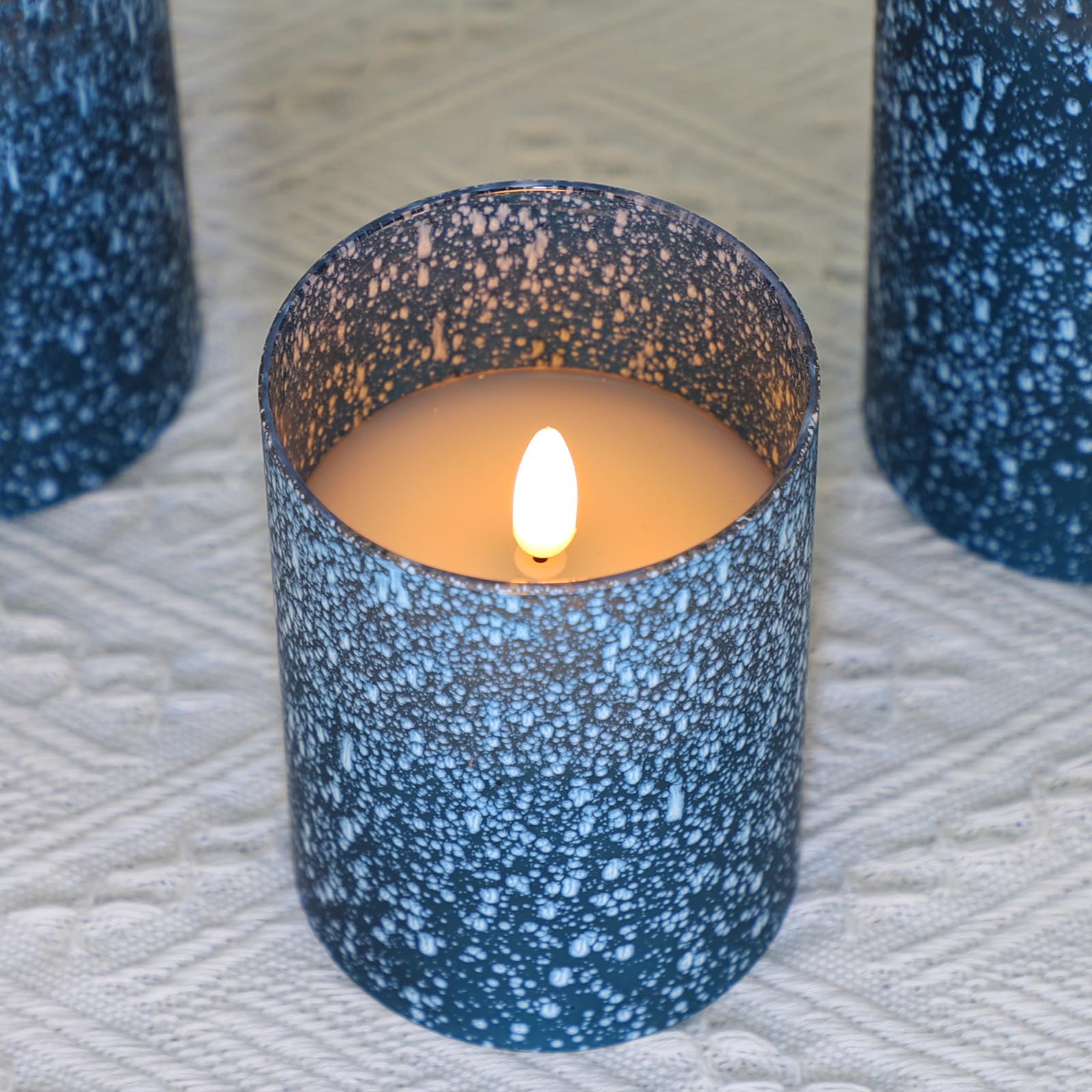 COVEGE blue sand blasted glass candles add coastal charm