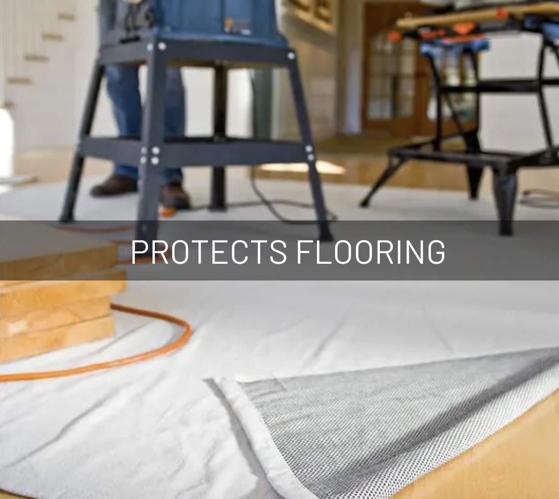 Off-white canvas drop cloth protects floors and furnishings