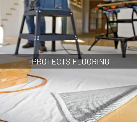 Off-white canvas drop cloth protects floors and furnishings