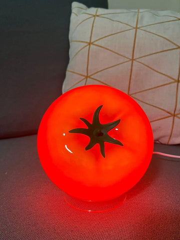 Cozifycasa Tomato Table Lamp with glow adds warm red light to shelves.