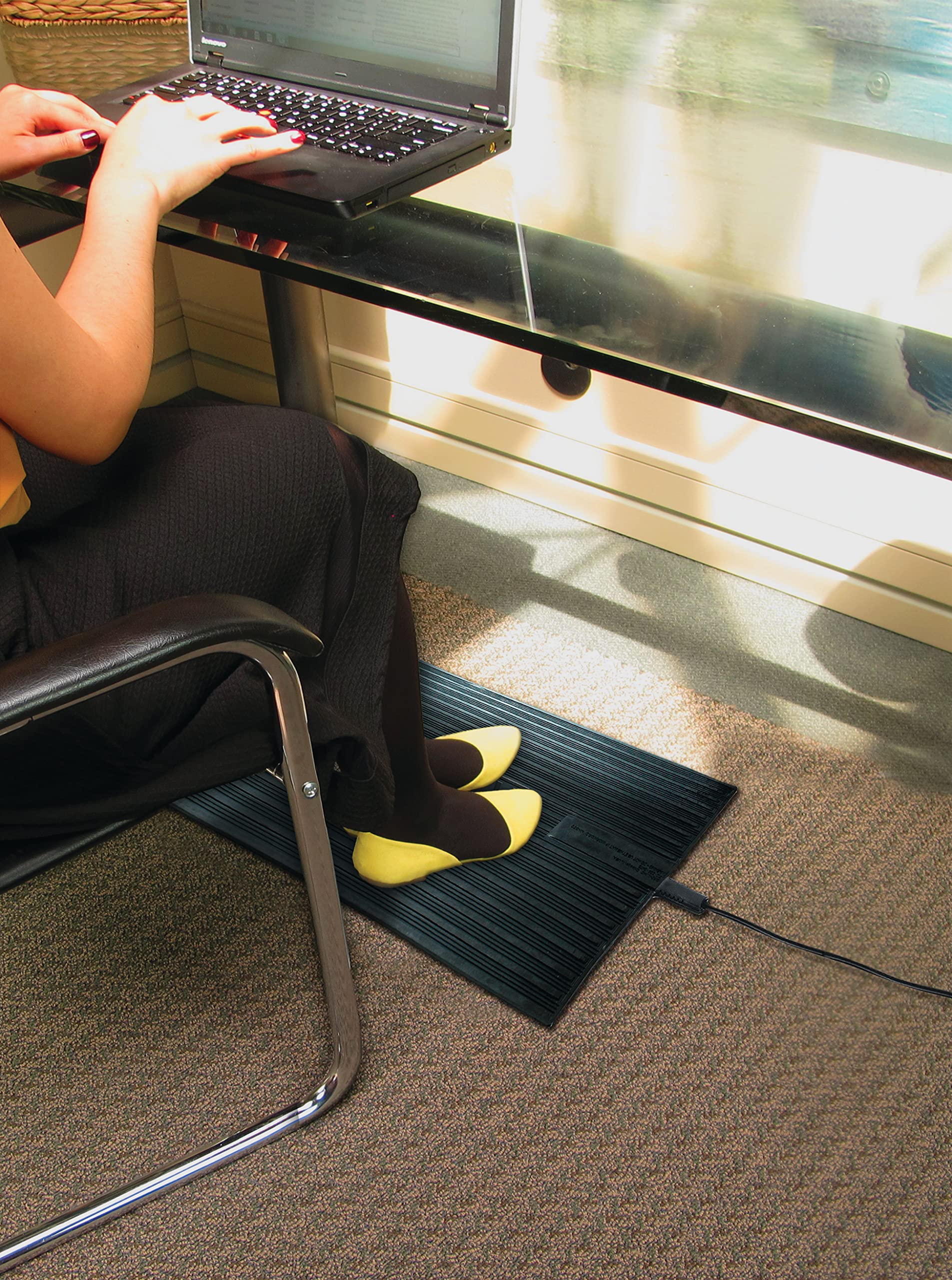 Cozy Products portable foot warmer rolled up for travel and desk use.