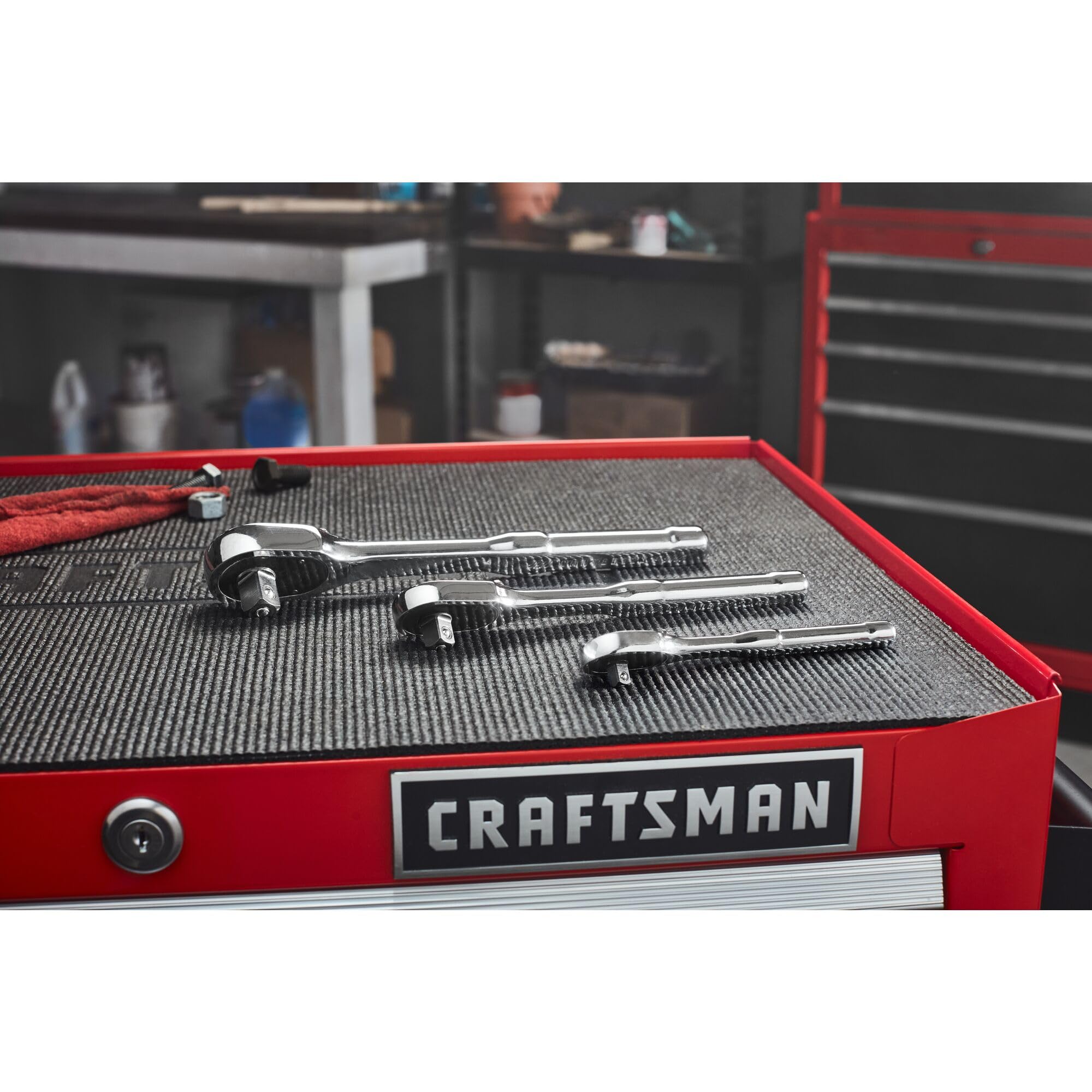 CRAFTSMAN ratchet in automotive workspace with corrosion-resistant chrome finish