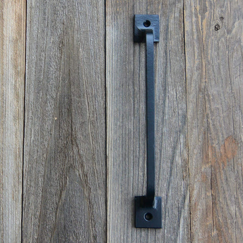 Craftsman Road close-up on wood surface, shows 5/16-inch thickness and robust grip.