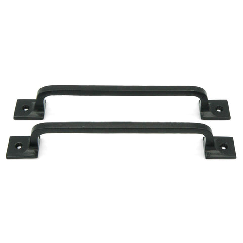 Craftsman Road pull handle on exterior gate provides a sturdy pull for frequent access.