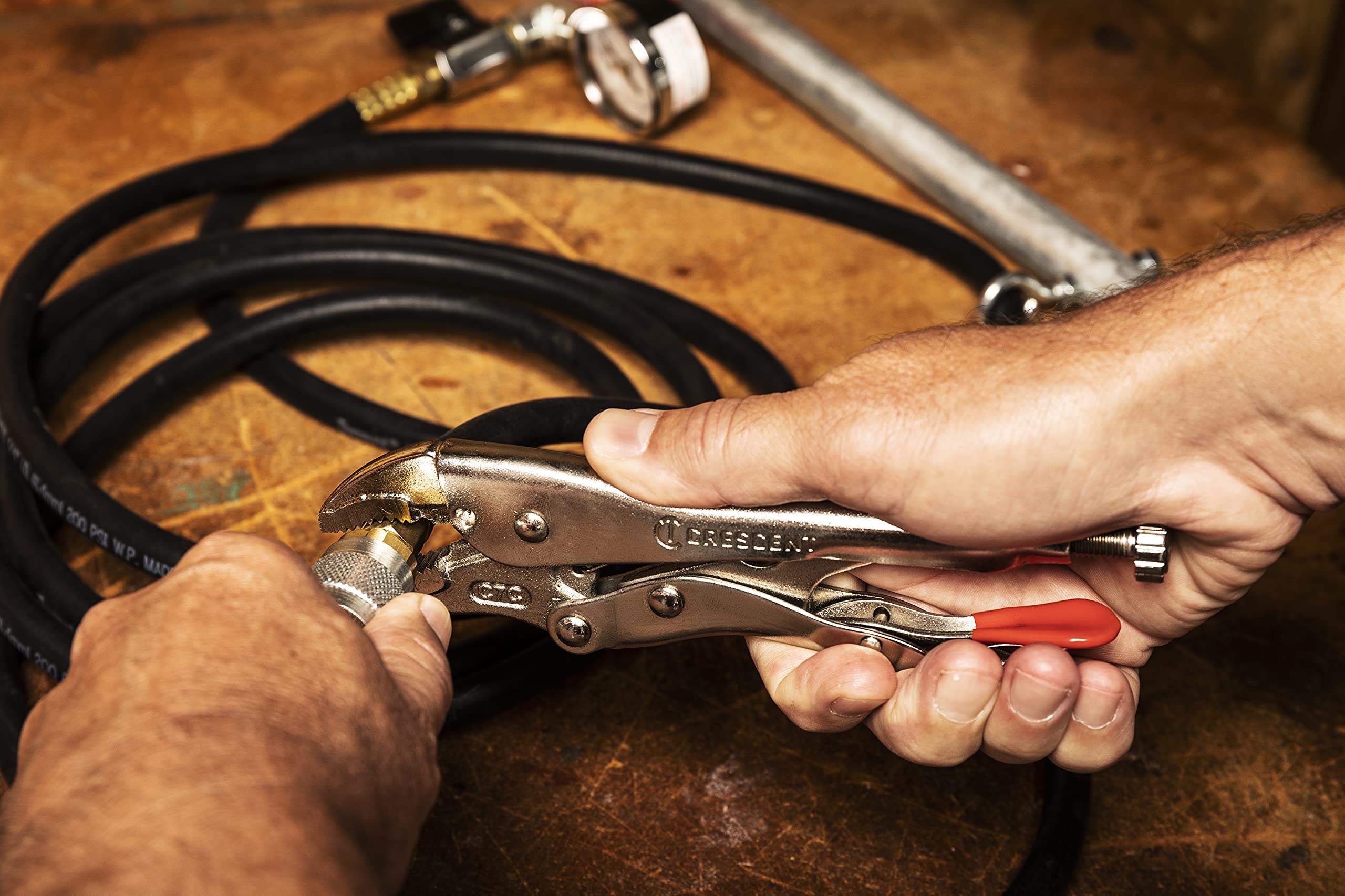 Crescent curved nose locking pliers with integrated wire cutter for versatile gripping