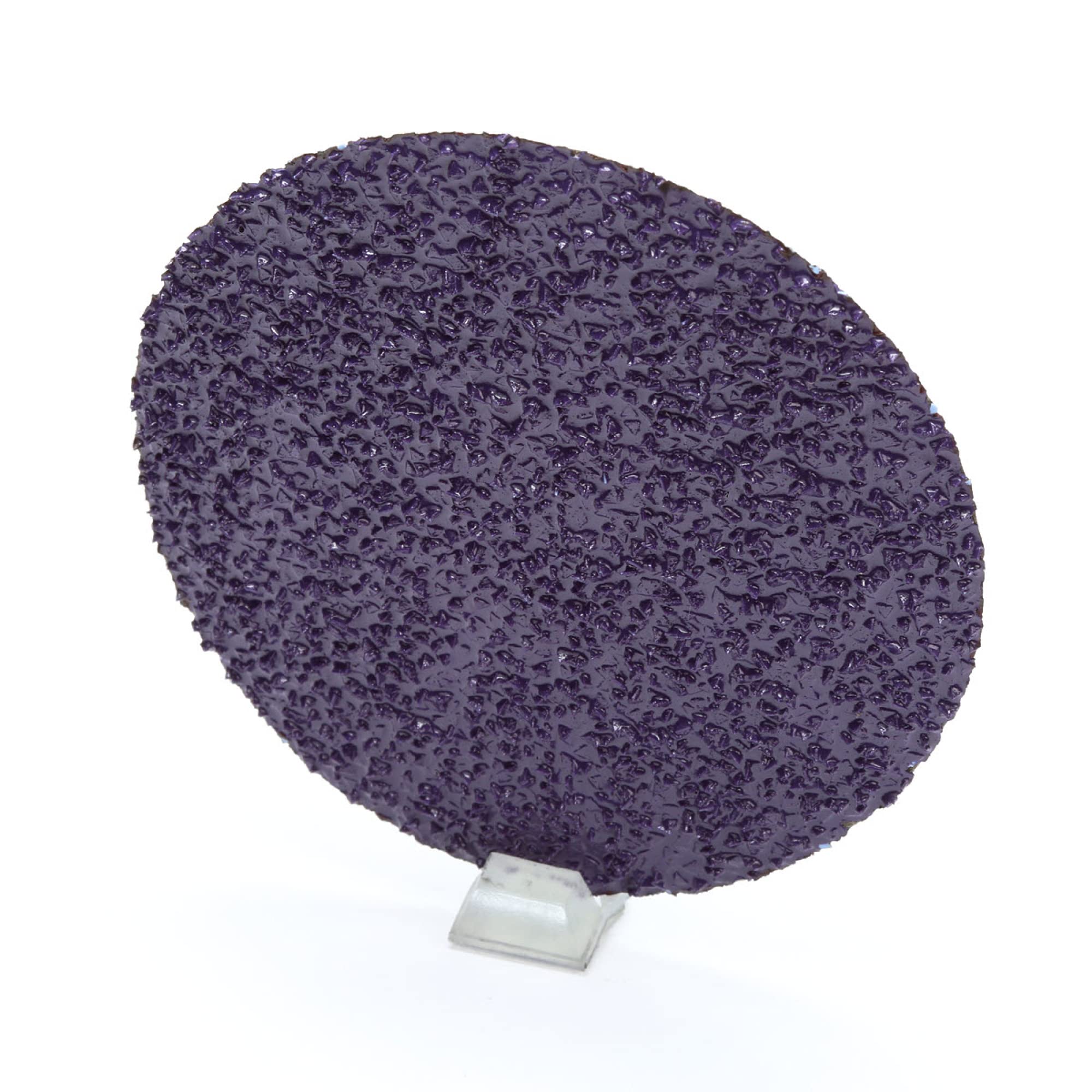 Cubitron II 3-inch disc in action during shaping and grinding.