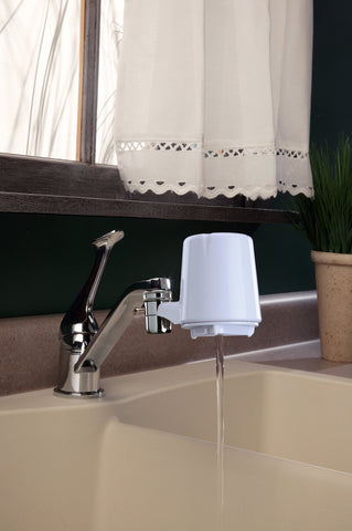 Close-up of filter cartridge and diverter valve, highlighting easy tool-free installation.