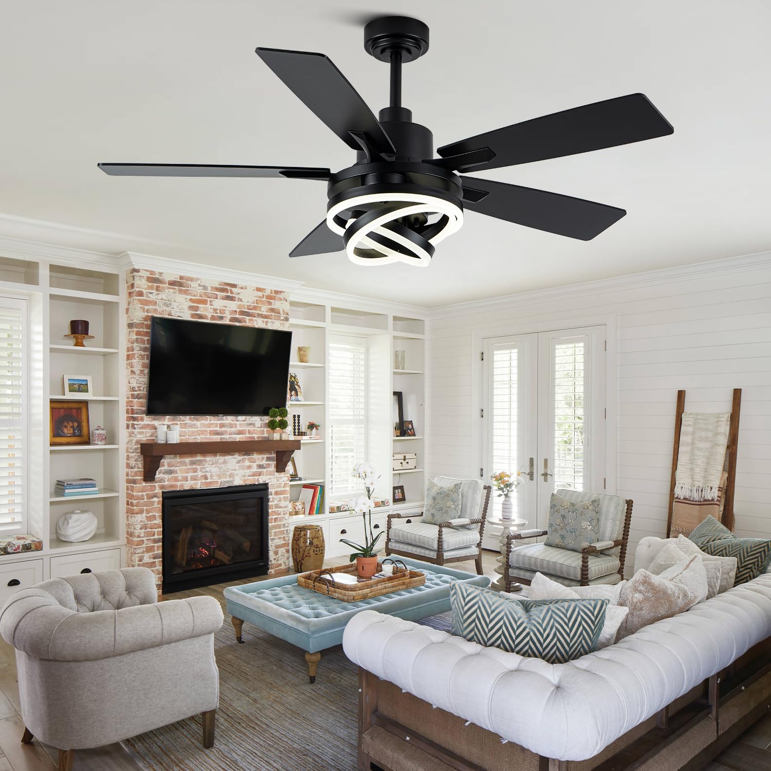 Curve Curio modern living room setup featuring the chandelier fan