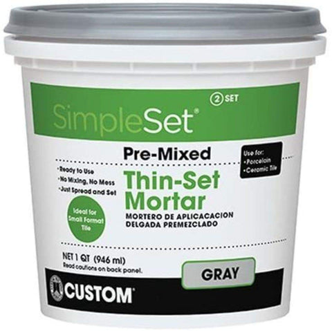 CUSTOM BLDG SimpleSet interior tile installation shows fast bonding with lighter color stone.