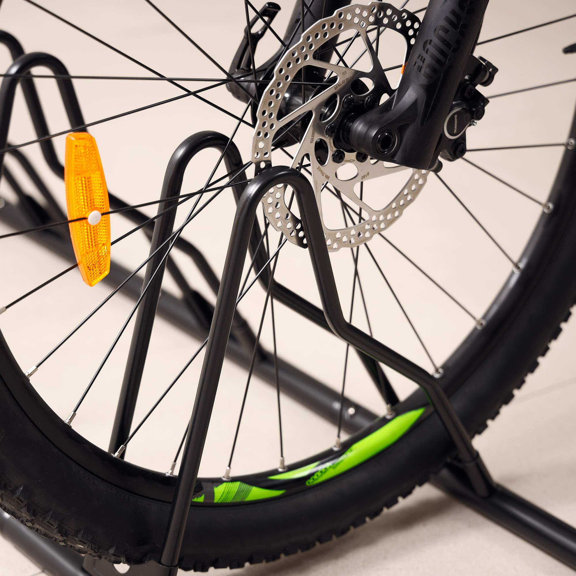 CyclingDeal easy-linked holders simplify setup and stacking of bikes.