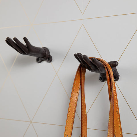 Danya B Palms Up dark brown finish brightens kitchen or bedroom walls.