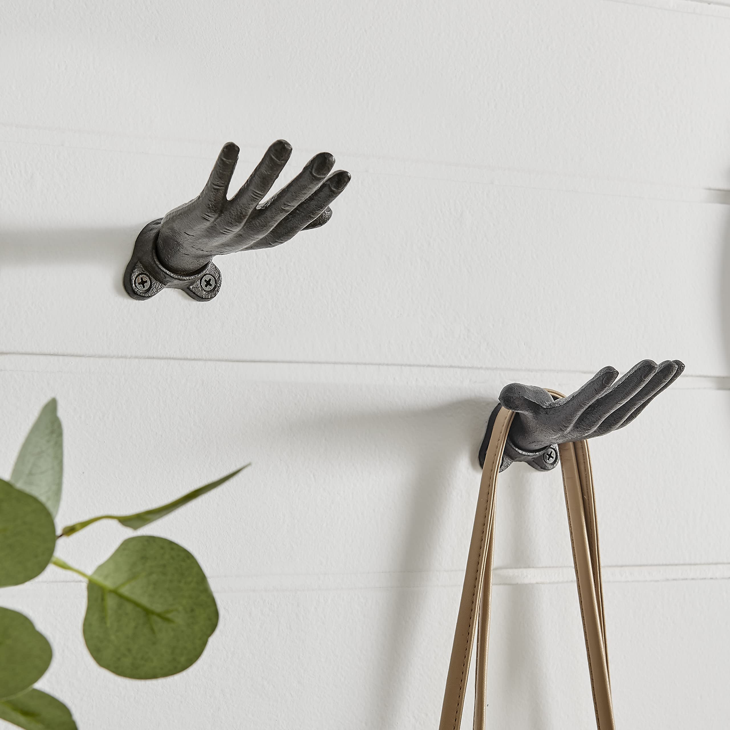 Danya B Palms Up hook with scarves adds whimsy while keeping accessories neatly displayed.
