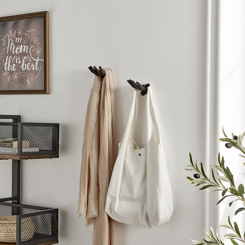 Danya B Palms Up jewelry display on fingers prevents tangles and adds style.