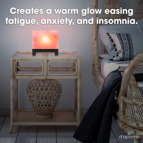 d'aplomb Himalayan salt lamp in a bedroom creating cozy evenings.