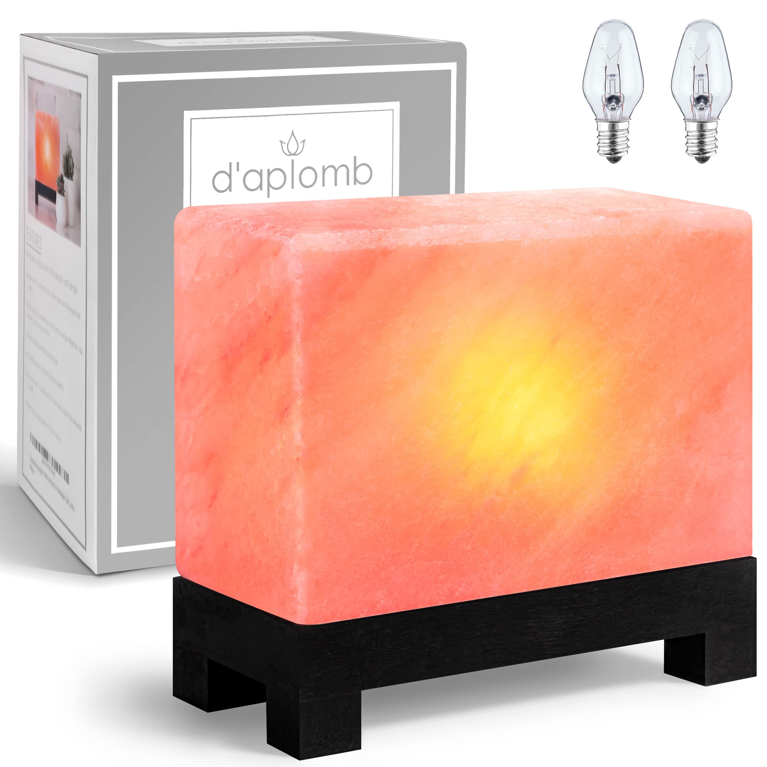 d'aplomb Himalayan salt lamp rectangle on wood base for warm ambiance.