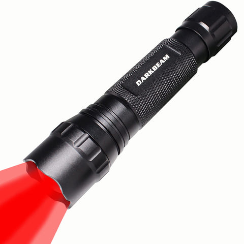 DARKBEAM front view of red light flashlight for outdoor use.