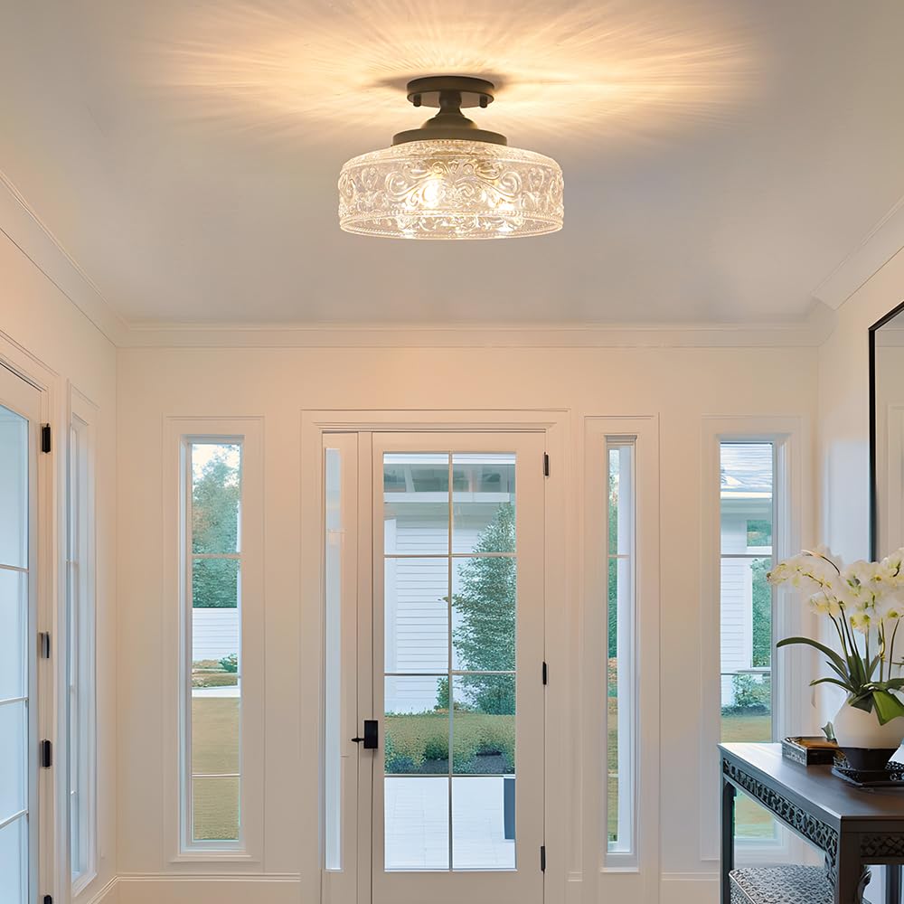 Daunton clear etched glass shade creates warm reflections.