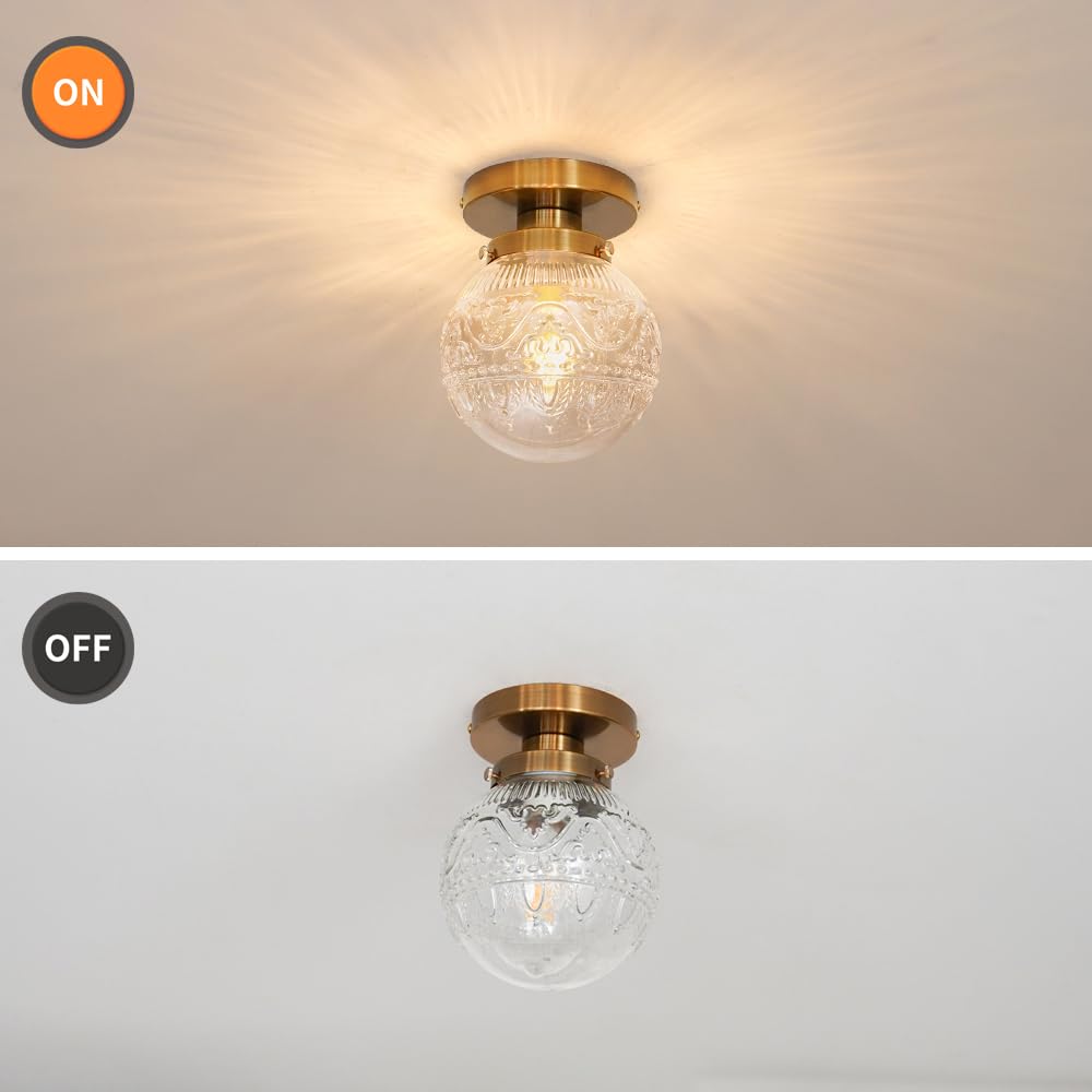 Daunton glass shade detail highlights craftsmanship and glow.