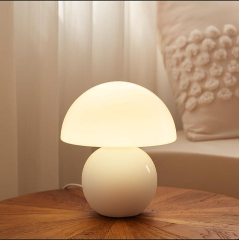 Dawnwake mushroom lamp with hand-blown glass shade for elegant bedside lighting.