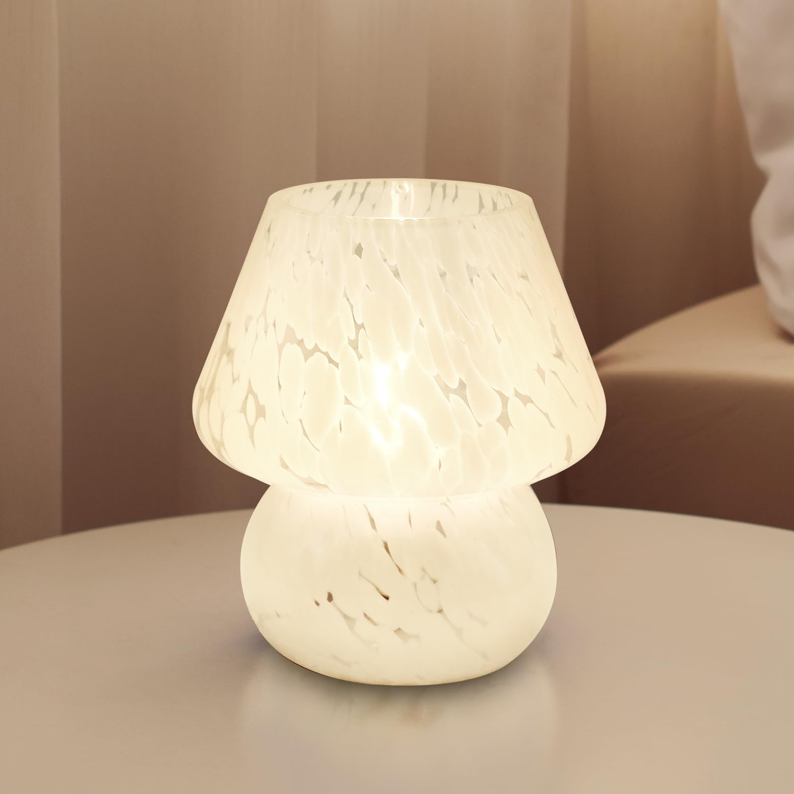 Dawnwake mushroom table lamp with hand-blown glass shade for elegant bedside lighting.