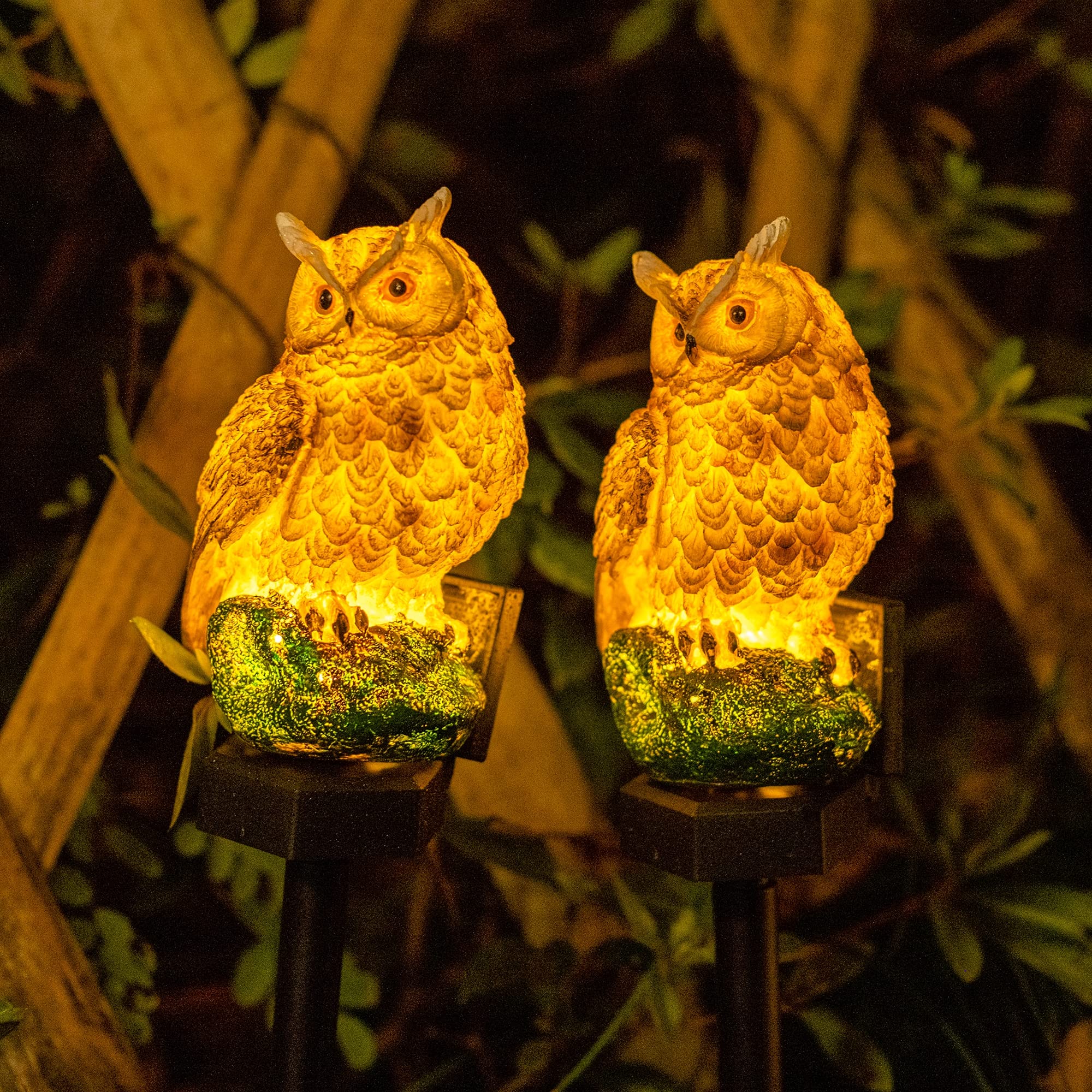 Dazzle Bright owl figure lights illuminate garden borders softly