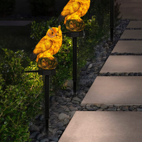 Dazzle Bright two-pack owl lights ready to install along walkway