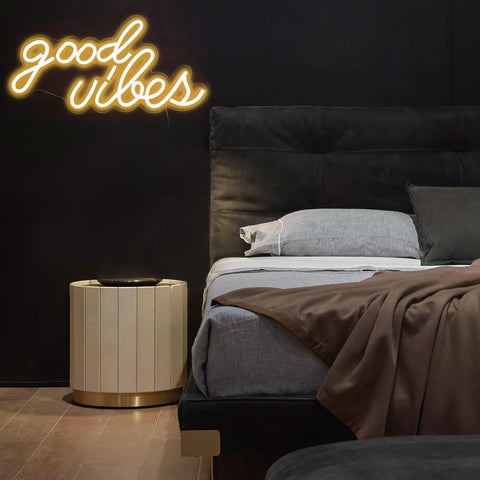 DECANIT Good Vibes neon sign used as a wedding backdrop with cozy warmth.