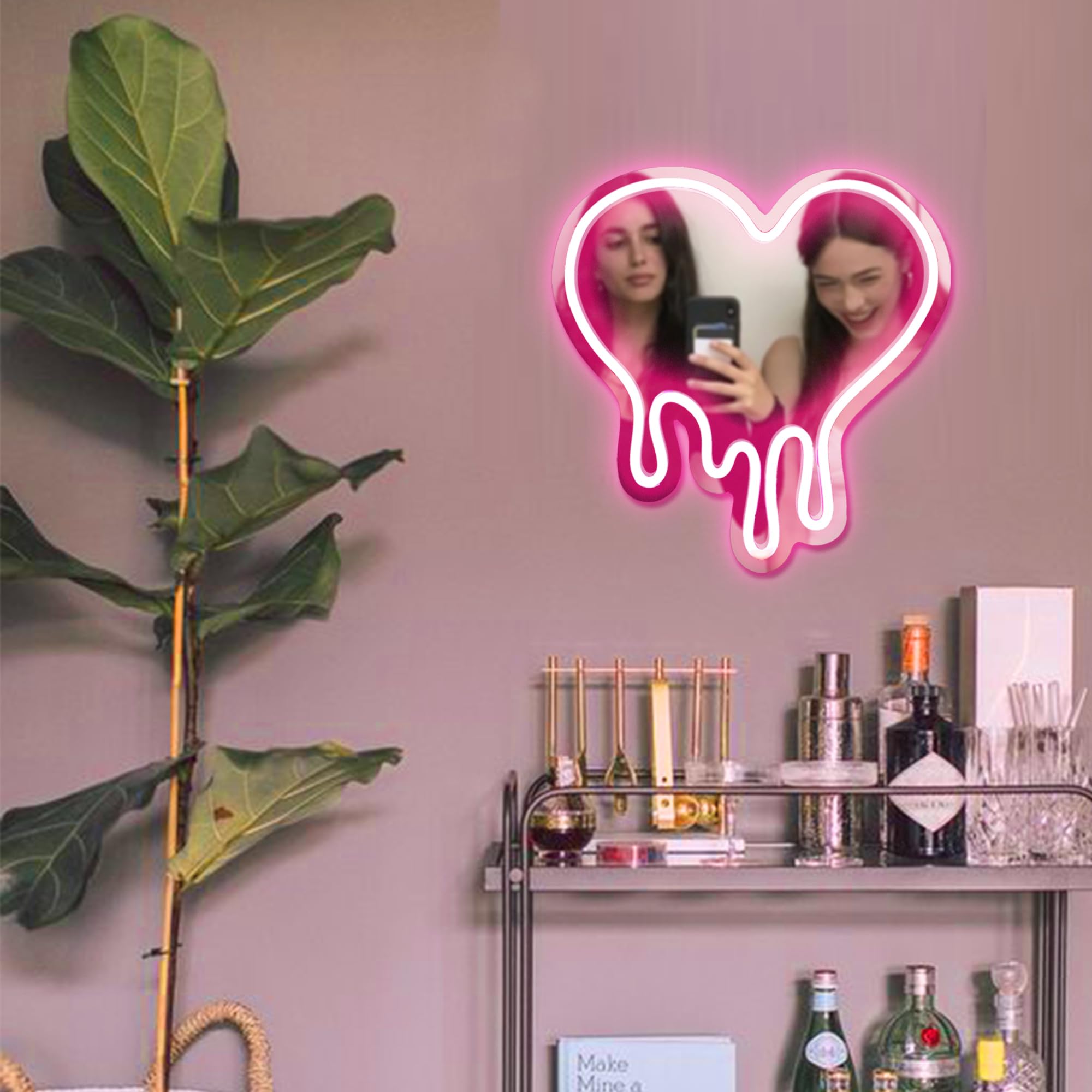 DECANIT Heart Neon Sign works as a pink backdrop for parties.