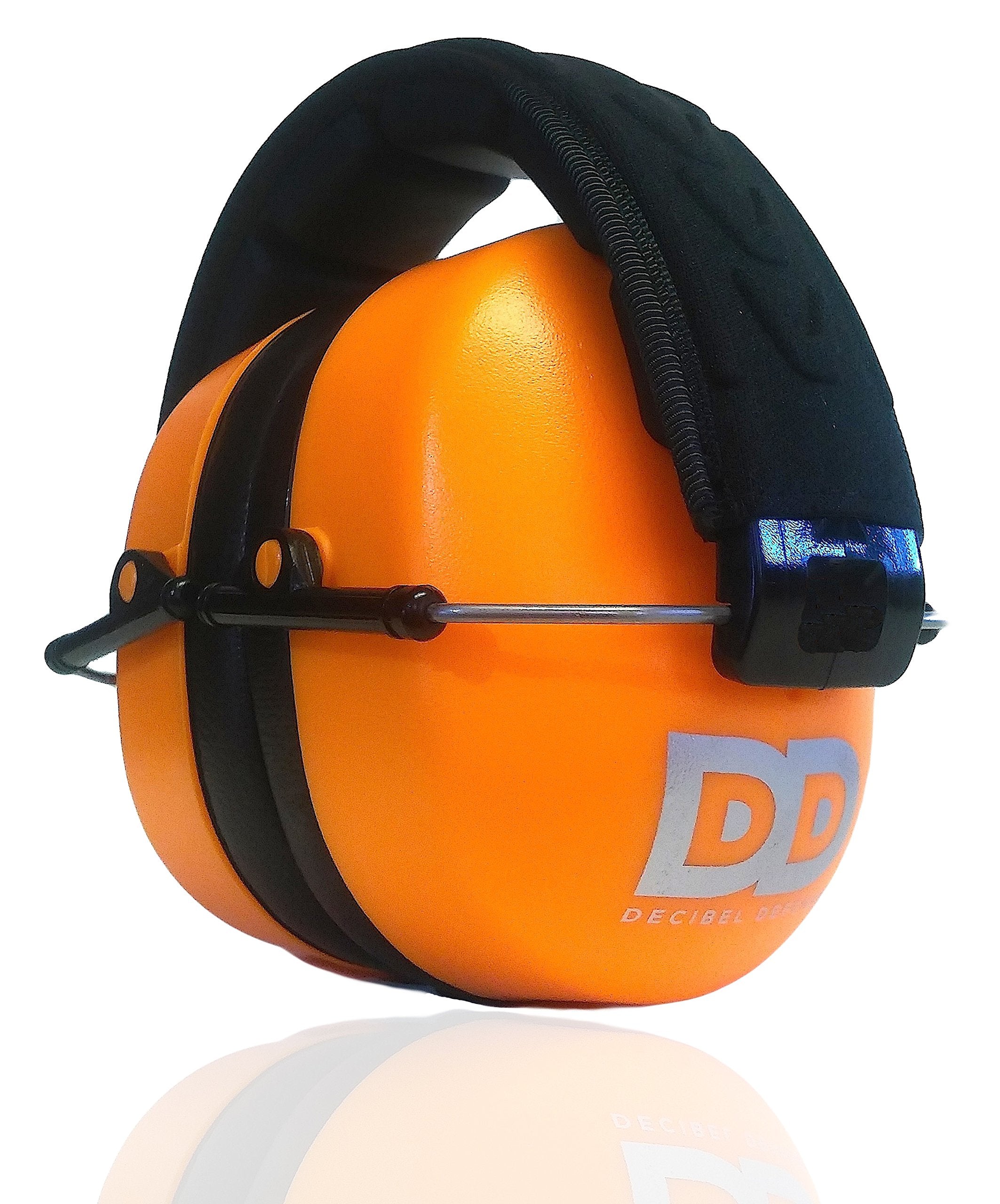 DECIBEL DEFENSE ear muffs worn on head during shooting.
