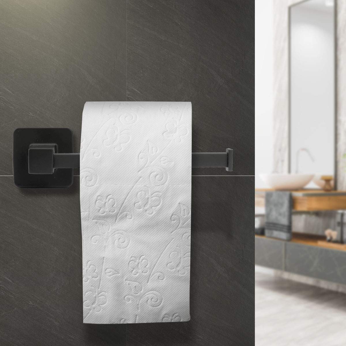 DEGULAS robe hook in matte black keeps garments organized.