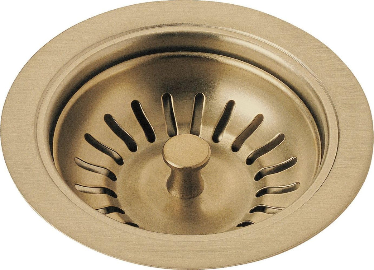 Delta 72010-CZ flange and strainer in champagne bronze for durable kitchen sink setup.