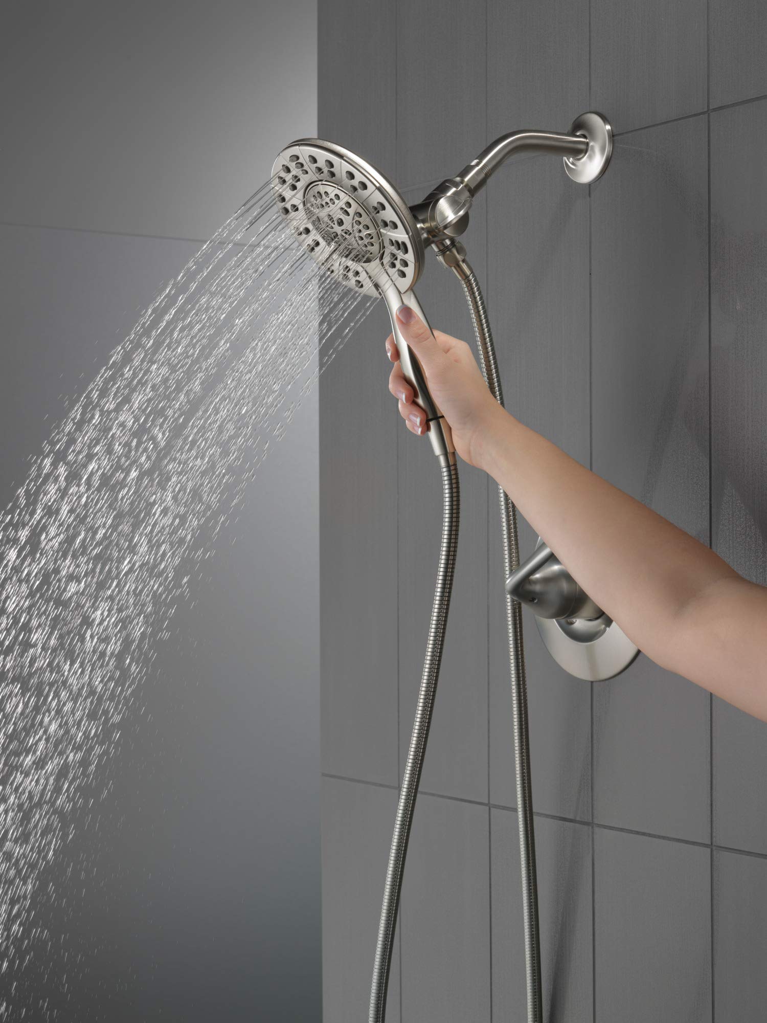 In2ition 2-in-1 dual shower head from Delta Arvo 14 Series offering flexible use.